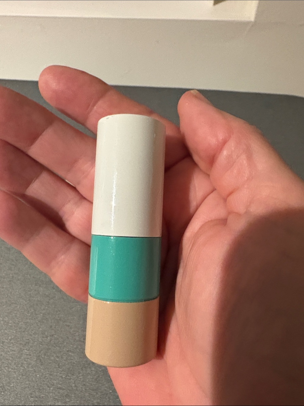 Hermes White/Beige & Teal Magnetic Lipstick Case.